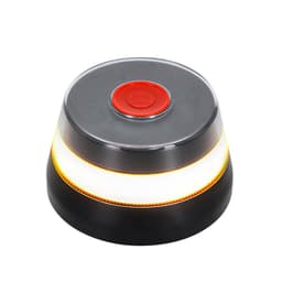 A round, black device with a red button and glowing orange light, featuring a logo.