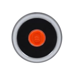 A round tech device in black and grey with a central orange button and a logo.