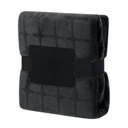 A folded Sanoa blanket in dark grey with a textured pattern, secured with a black strap.
