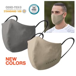 A pair of reusable hygienic masks in grey and beige, featuring a logo, displayed on a model.