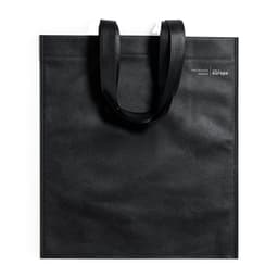 A black bag with sturdy handles, featuring a subtle logo on one side. Made from 70% recycled material.