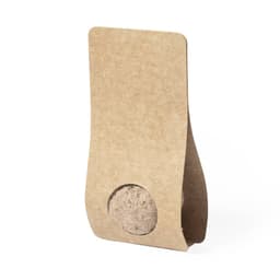 A brown cardboard seed packet with a circular viewing window showcasing the seeds inside.