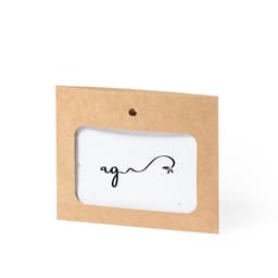 A name badge in a brown card holder with a cut-out window, featuring a simple black design and logo.