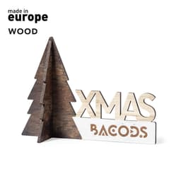 A wooden Christmas decoration featuring a stylised tree and the word "XMAS" in a mix of brown and cream tones.