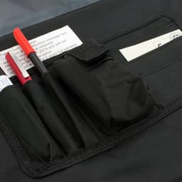 A black bag featuring multiple pockets, including slots for pens and a small compartment. Includes a logo.