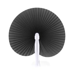 A decorative black fan with a pleated design and a white handle. It has a simple yet elegant appearance.