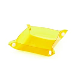 A yellow Flot Coin Tray with rounded corners and circular cutouts on each side, designed for holding small items.