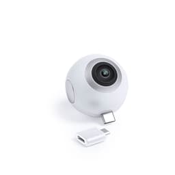 A compact white camera shaped like a sphere, accompanied by a USB adapter. It features a circular lens on the front.