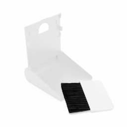 A white dustpan with a black brush resting beside it, featuring a simple design. The set has a compact storage option.