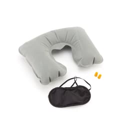 A grey inflatable neck pillow, earplugs, and a black sleep mask, all arranged neatly for travel comfort.
