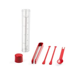 A clear drink bottle accompanied by red measuring tools, including a cap, tongs, and two stirrers.