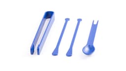 A blue cocktail set including a tongs, three stirrers, and a spoon, all arranged neatly.