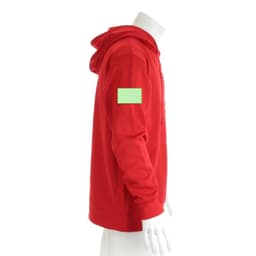 A red adult technical sweatshirt with a hood and a green patch on the sleeve.