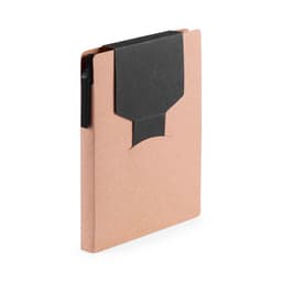 A tan notebook with a black flap and a pen attached, featuring a simple design and a logo on the cover.