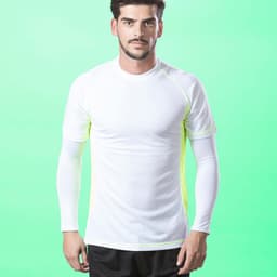 A white athletic shirt with long sleeves, featuring bright yellow accents on the sides. It has a logo on the chest.