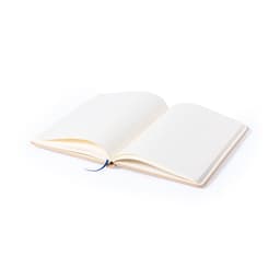 An open Raimok Notebook with blank pages, featuring a ribbon bookmark and a soft cover in a light shade.