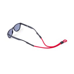 Sunglasses with dark lenses and a red strap, featuring a logo on the frame, ideal for leisure and outdoor activities.