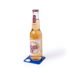 A drink bottle on a blue coaster, featuring a round indent, showcasing a stylish design.