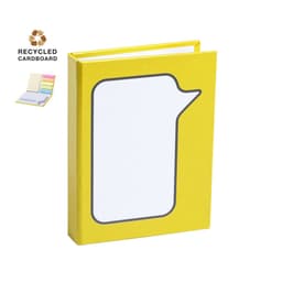 A yellow notebook with a speech bubble design, made from recycled cardboard, featuring a logo.