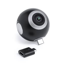A round black camera featuring a lens and a USB connector, accompanied by a small adapter.
