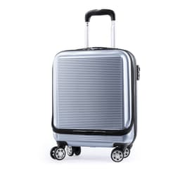 A wheeled bag in silver with a ridged design and a retractable handle. It features four wheels for easy transport.