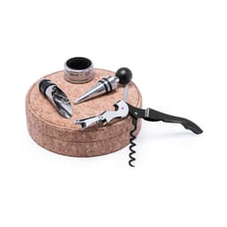A wine accessories set featuring a corkscrew, pourer, wine stopper, and aerator, presented on a round cork base.