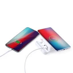 A power bank in white with two smartphones connected by charging cables, both showing battery status indicators.