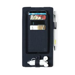 A wireless charger in navy with a slot for a phone, cardholder, pen, and earphones. It has a logo.