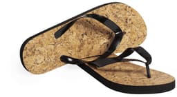 Black Sebrin flip flops with a cork footbed, featuring thong straps and a simple design.