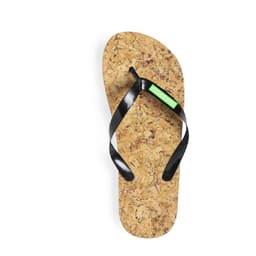 A cork flip flop with black straps and a small green accent, featuring a logo on the strap.
