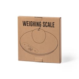 A weighing scale in a brown cardboard box featuring an illustration of an apple and a logo on the packaging.