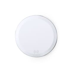 A round, white wireless charger with a smooth surface and a logo, designed for fast charging devices.