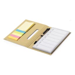 A tan notebook with a pen, sticky notes in yellow, pink, and blue, and a segmented notepad inside.