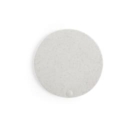A circular, speckled grey mirror with a smooth surface and a small attachment point on the bottom. It has a branding logo.