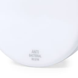 A white yoyo with an antibacterial feature, featuring a logo and a smooth, rounded surface.