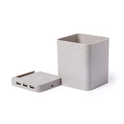 A grey, square container with a removable lid featuring multiple USB ports, made from eco-friendly material.