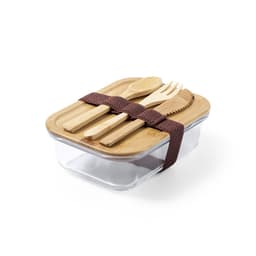 A glass lunch box with a bamboo lid and utensils, secured with a brown strap. The box is rectangular and transparent.