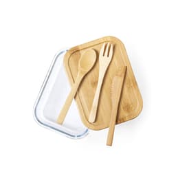 A bamboo lunch box with a glass lid, accompanied by a wooden spoon, fork, and knife on top.