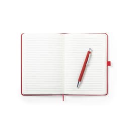A red notepad with lined pages and a matching red pen resting on open pages. It features a logo on the cover.