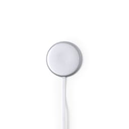 A circular silver wireless charger with a white cable attached, featuring a minimalistic design.
