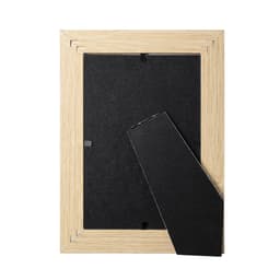 A photo frame with a natural wood finish and a black backing. It features a logo on the back.