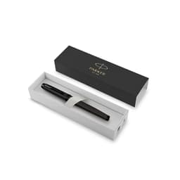 A black metal fountain pen displayed in a white box with a black outer sleeve, featuring a logo.