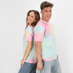 A pair of models wearing pastel tie-dye Vega T-Shirts in pink, blue, and green. The shirts feature a logo.