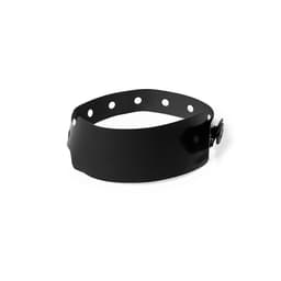 A black silicone wristband with multiple holes for adjustments and a fastening buckle.