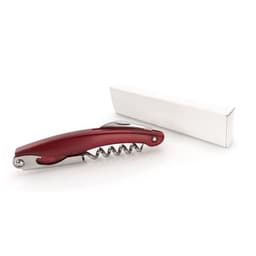 A red corkscrew with a stainless steel spiral, placed next to a plain white box.