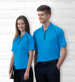 A blue Dri Gear Dimension polo shirt for men and women, featuring a zippered collar and subtle branding.