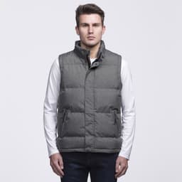 A grey puffa vest with a high collar and buttons, featuring two side pockets and a logo. Model is wearing a white long-sleeve shirt.