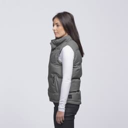 A grey puffa vest with a high collar and side pockets, displayed on a model from the side.
