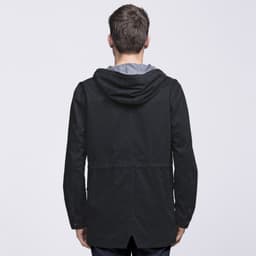 A black twill jacket featuring a hood and a stylish cut, shown from the back. It has a logo on the back.
