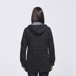 A black twill jacket featuring a hood and a casual cut, shown from the back. The jacket has a logo.
